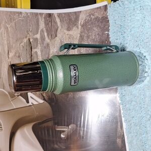 Vintage stanley thermos, 32 ounce, green and silver.